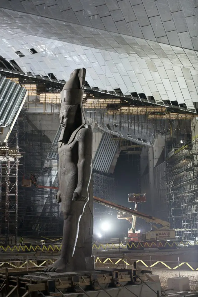 Construction work proceeds at the Grand Egyptian Museum around the 82-ton colossus of Ramses II after it was moved in February 2018.